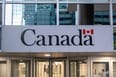 Doi români arestați în Canada pentru o schemă cu ATM-uri